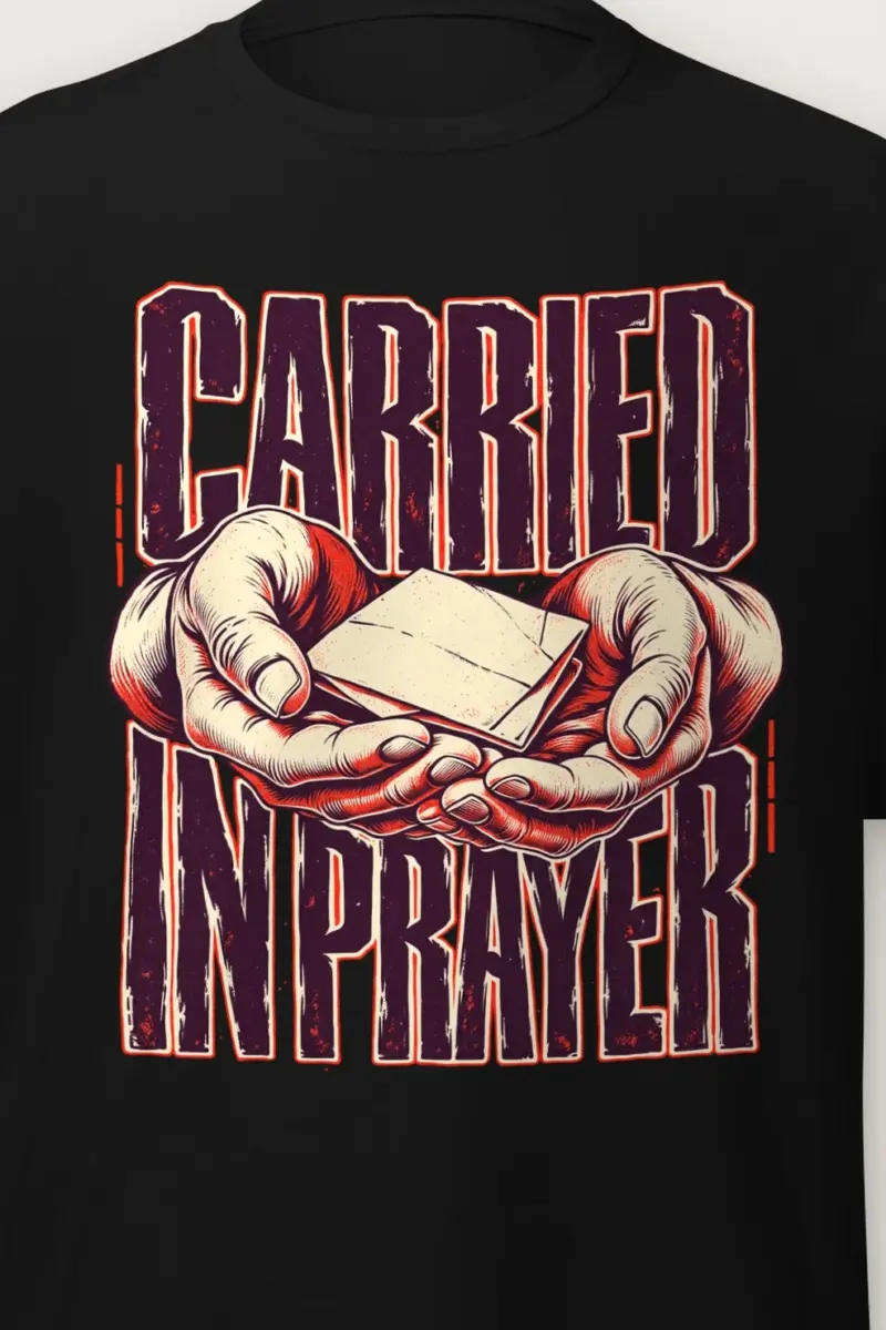 "Carried in Prayer" Heavyweight Unisex Crewneck T-shirt - the graphic up close