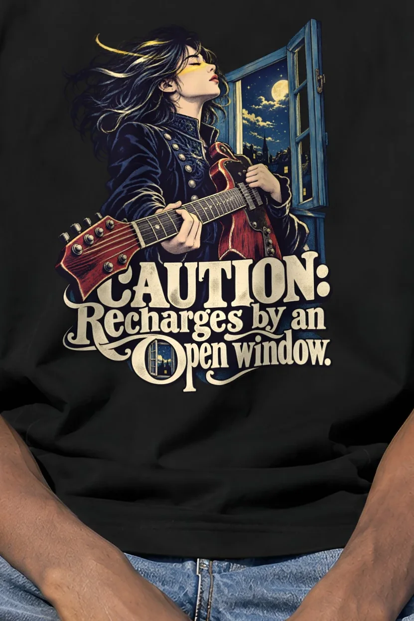 "Caution Recharges by an Open Window" Unisex Oversized Heavyweight Crewneck T-Shirt - the graphic up close
