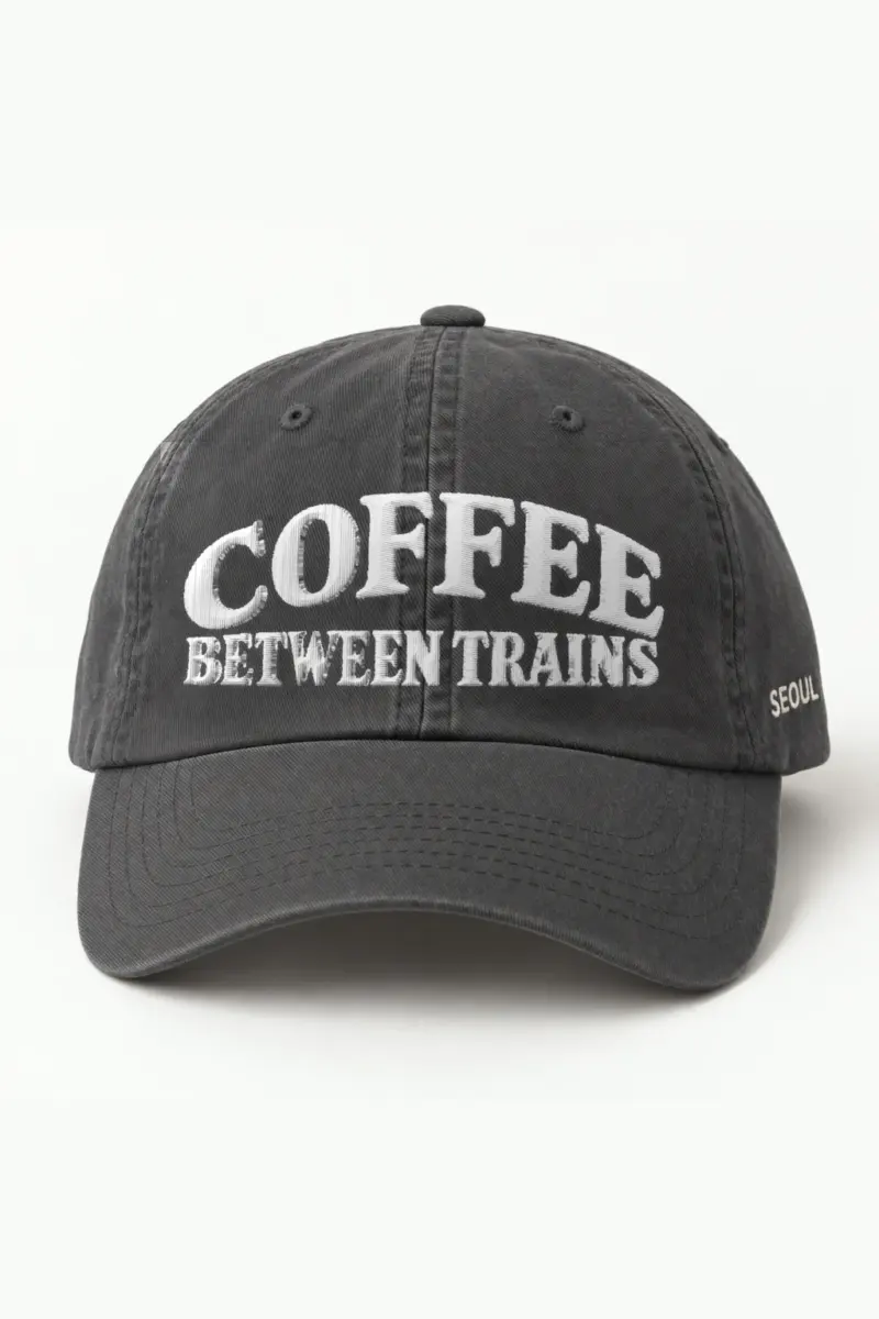 "Coffee Between Trains" Classic Dad Hat · Embroidered