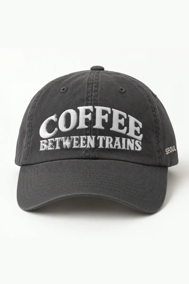 "Coffee Between Trains" Classic Dad Hat · Embroidered