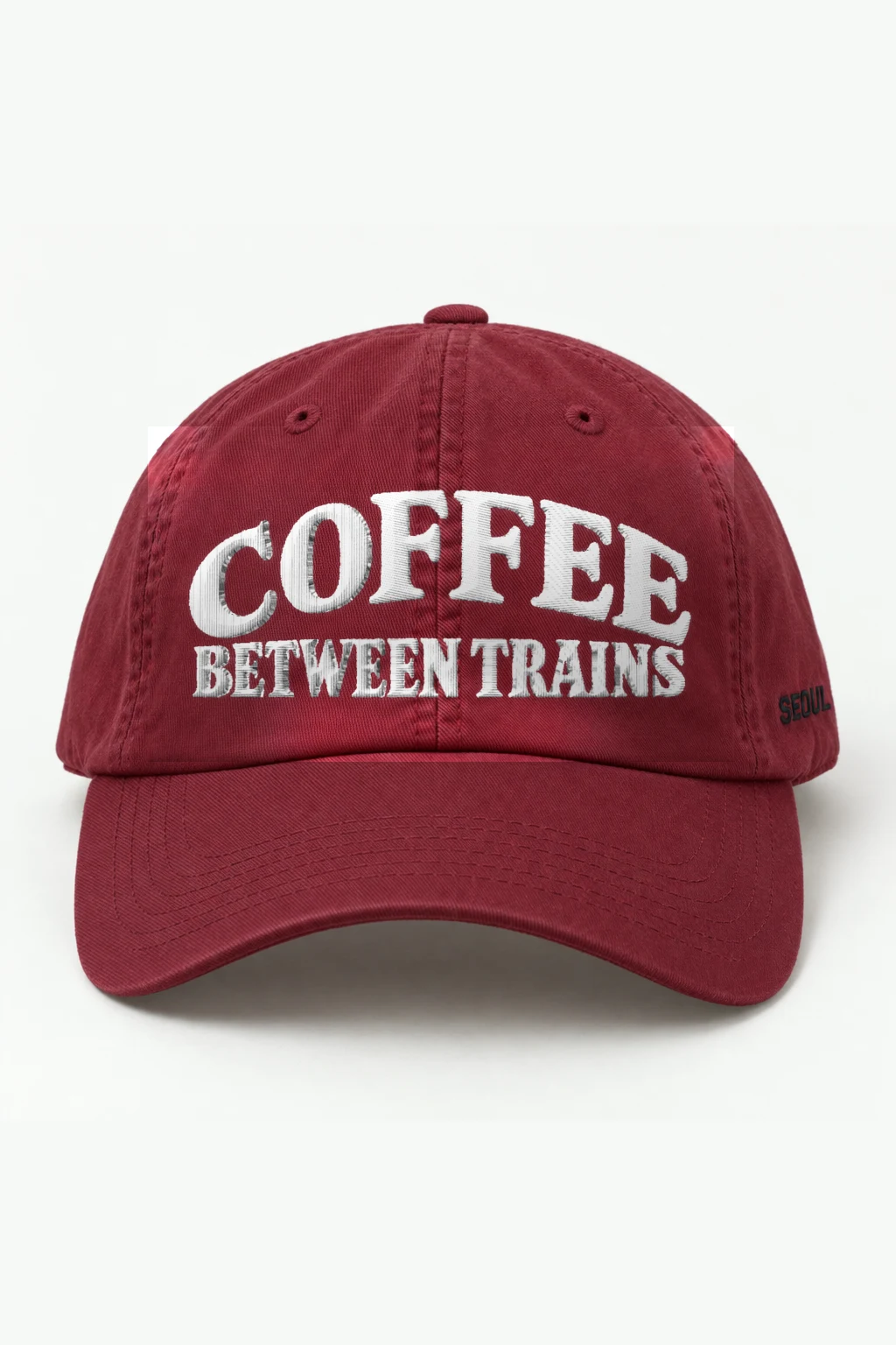 "Coffee Between Trains" Classic Dad Hat · Embroidered