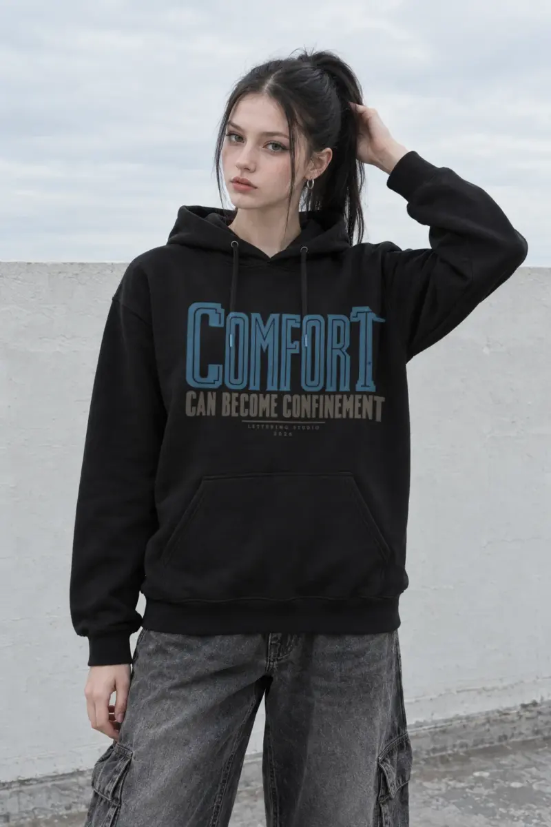 “Comfort Can Become Confinement” Heavy Blend Unisex Pullover Hoodie
