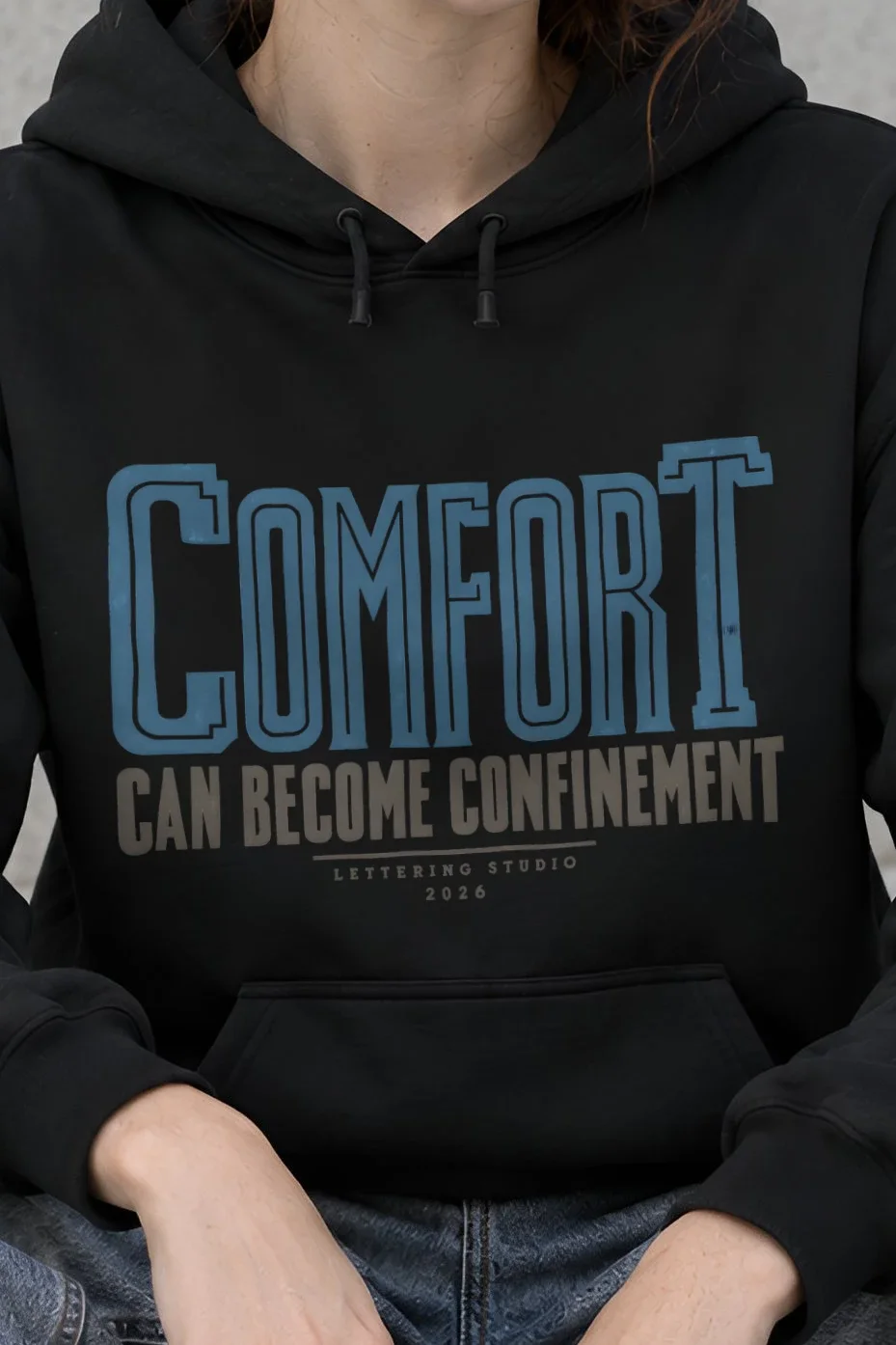 "Comfort Can Become Confinement" Heavy Blend Unisex Pullover Hoodie - the graphic up close