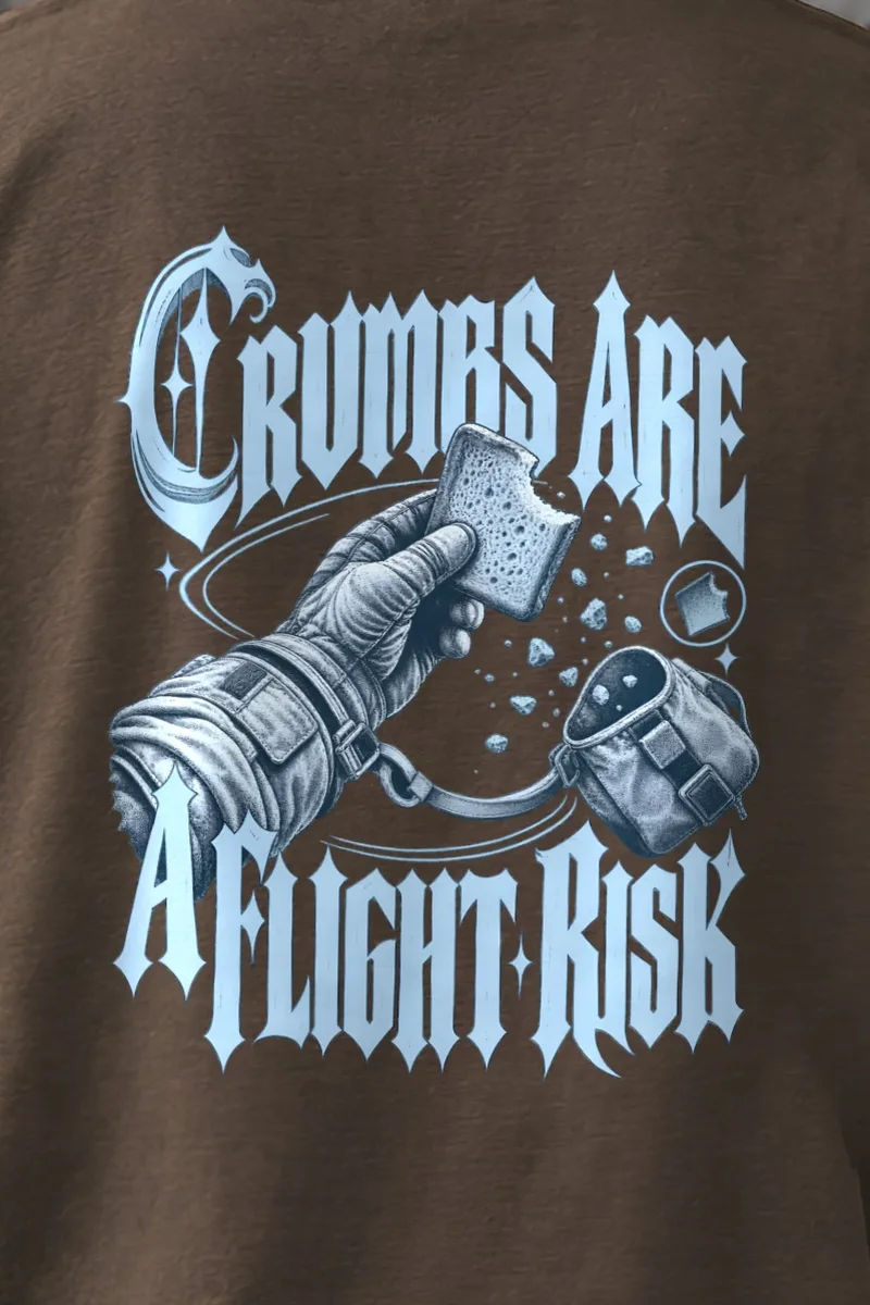"Crumbs Are A Flight Risk" Men’s Oversized Heavyweight Crewneck T-Shirt - the graphic up close