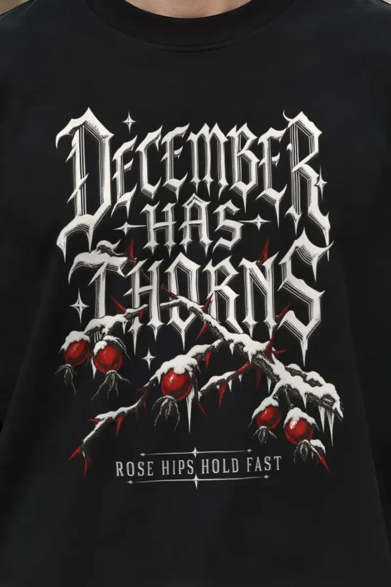 "December Has Thorns" Men’s Oversized Heavyweight Crewneck T-Shirt - the graphic up close
