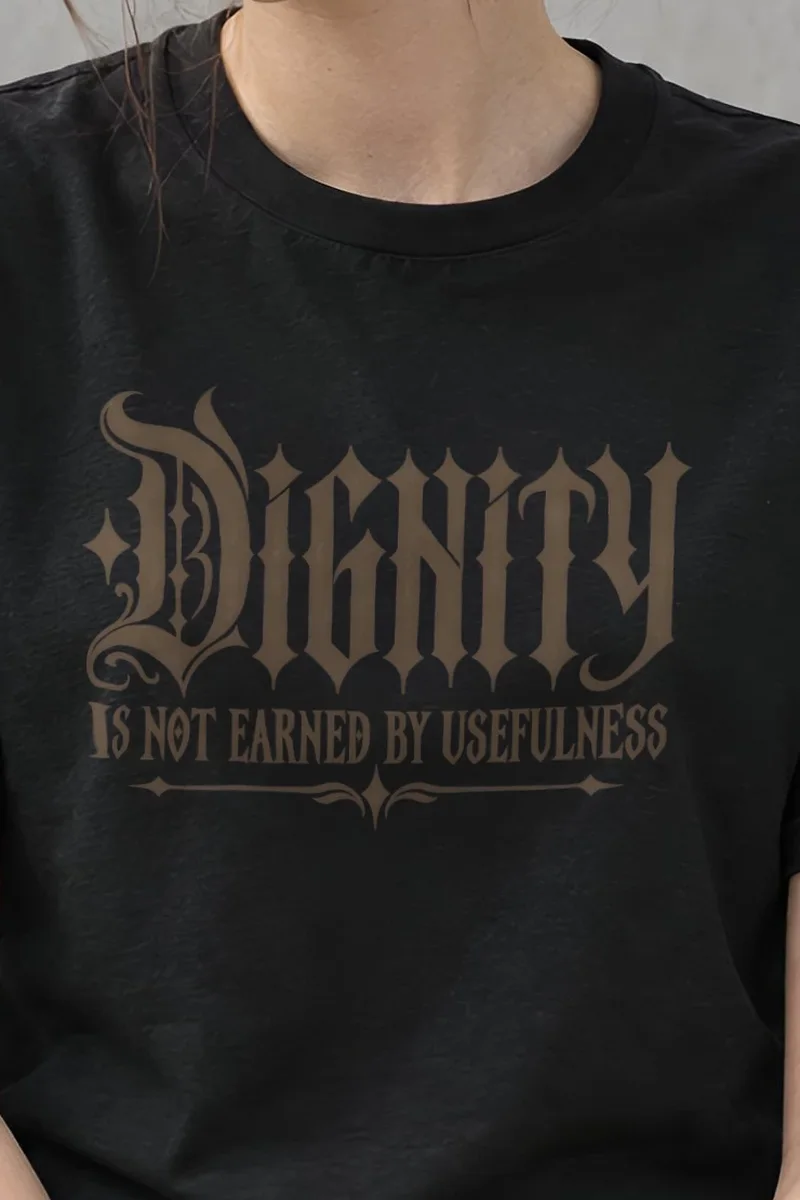 "Dignity Is Not Earned by Usefulness" Heavyweight Unisex Crewneck T-shirt - the graphic up close