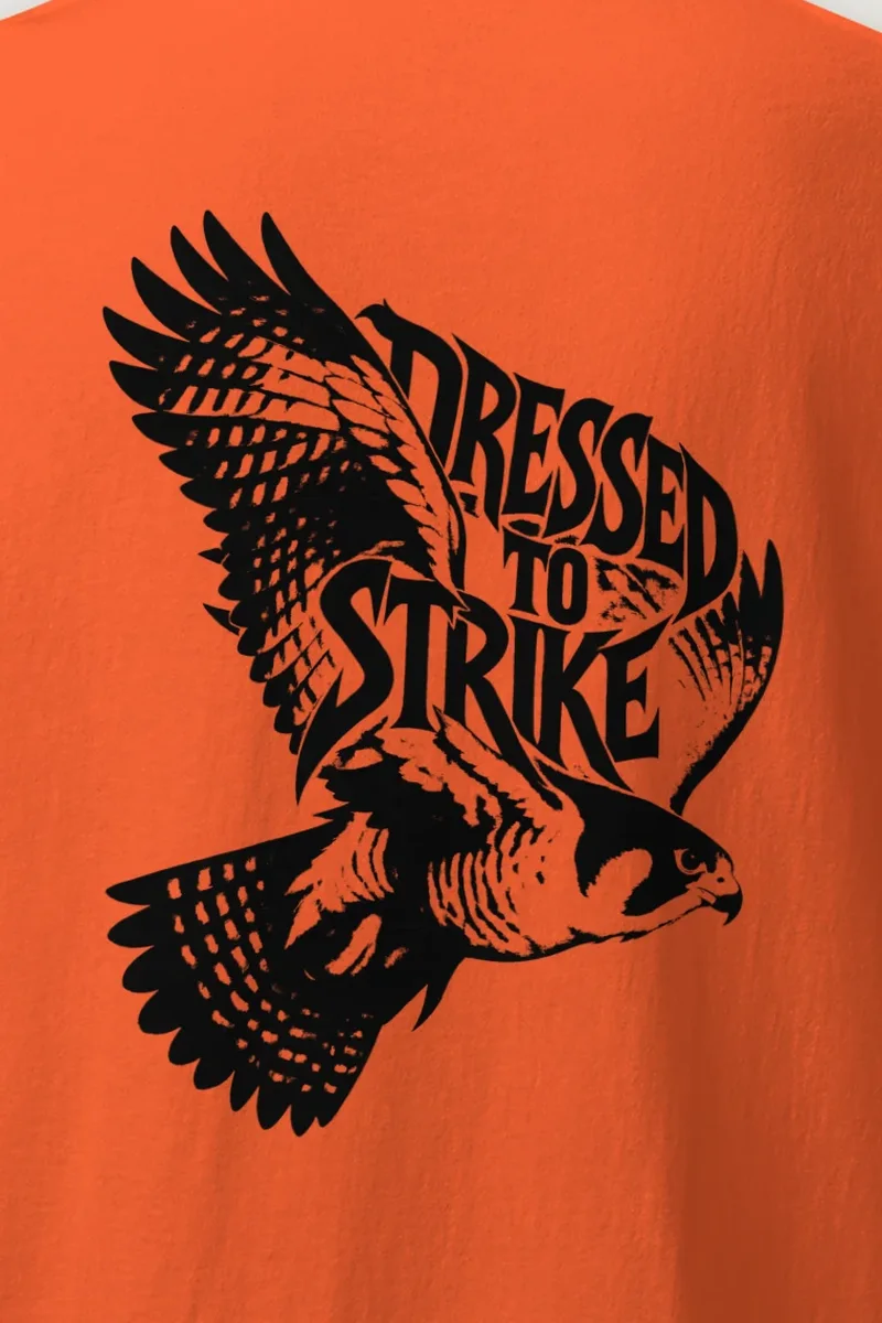 "Dressed to Strike" Heavyweight Unisex Crewneck T-shirt - the graphic up close