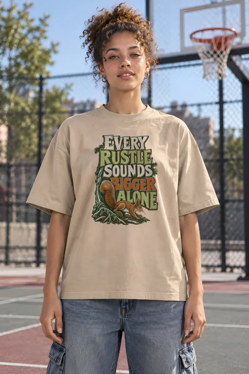 "Every Rustle Sounds Bigger Alone" Unisex Oversized Heavyweight Crewneck T-Shirt