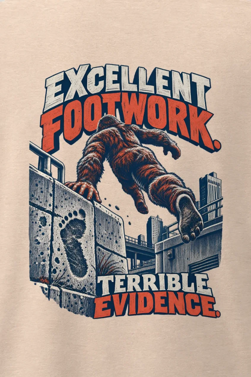 "Excellent Footwork Terrible Evidence" Men’s Oversized Heavyweight Crewneck T-Shirt - the graphic up close