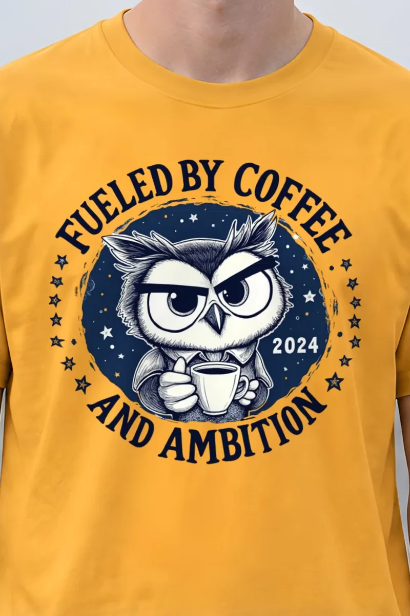 "Fueled By Coffee And Ambition" Heavyweight Unisex Crewneck T-shirt - the graphic up close