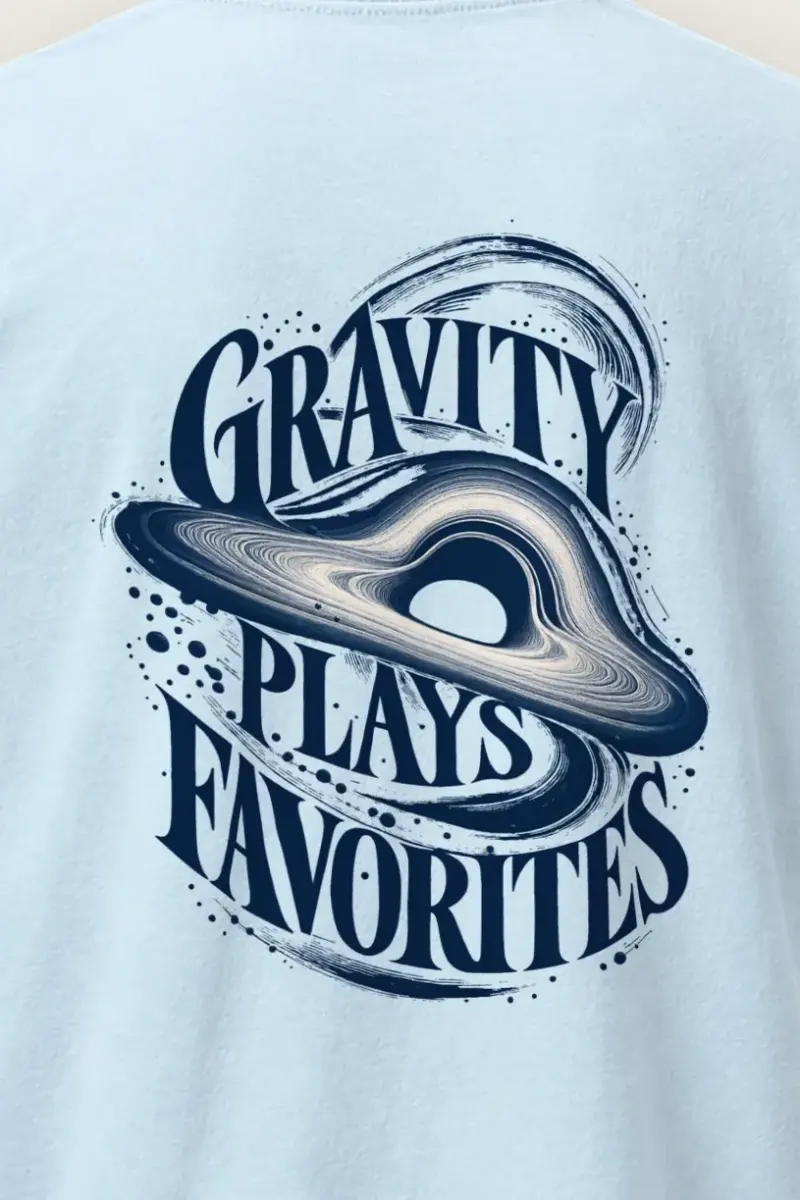 "Gravity Plays Favorites" Heavyweight Unisex Crewneck T-shirt - the graphic up close