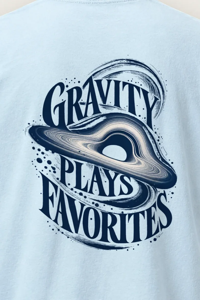 "Gravity Plays Favorites" Heavyweight Unisex Crewneck T-shirt - the graphic up close