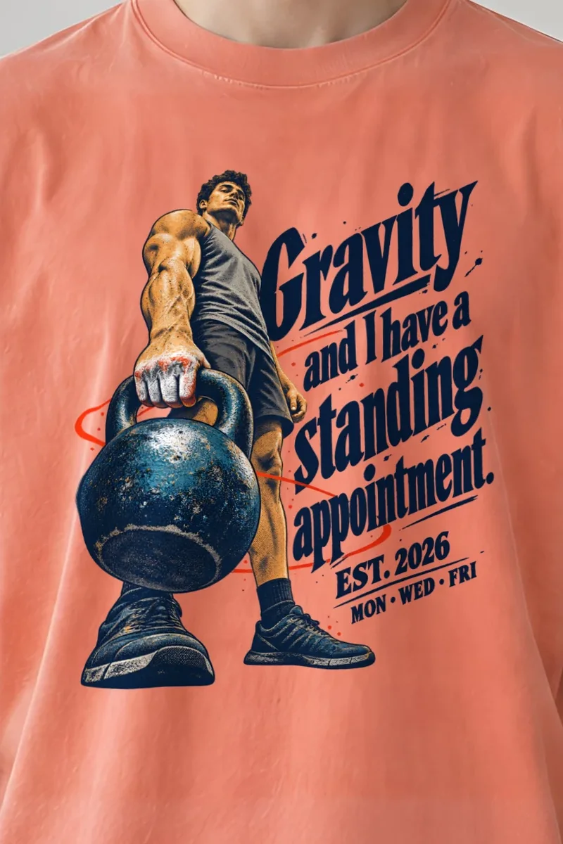 "Gravity Standing Appointment" Unisex Oversized Heavyweight Crewneck T-Shirt - the graphic up close