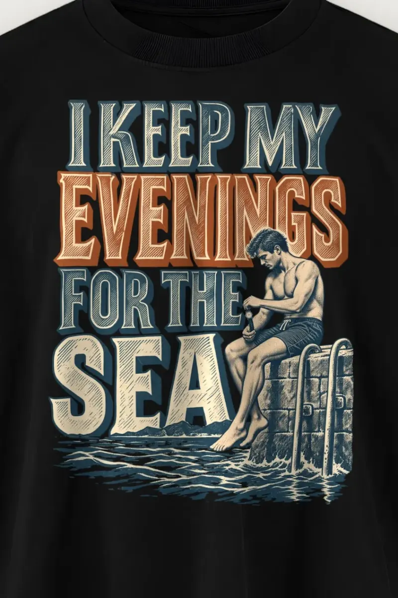 "I Keep My Evenings for the Sea" Men’s Oversized Heavyweight Crewneck T-Shirt - the graphic up close