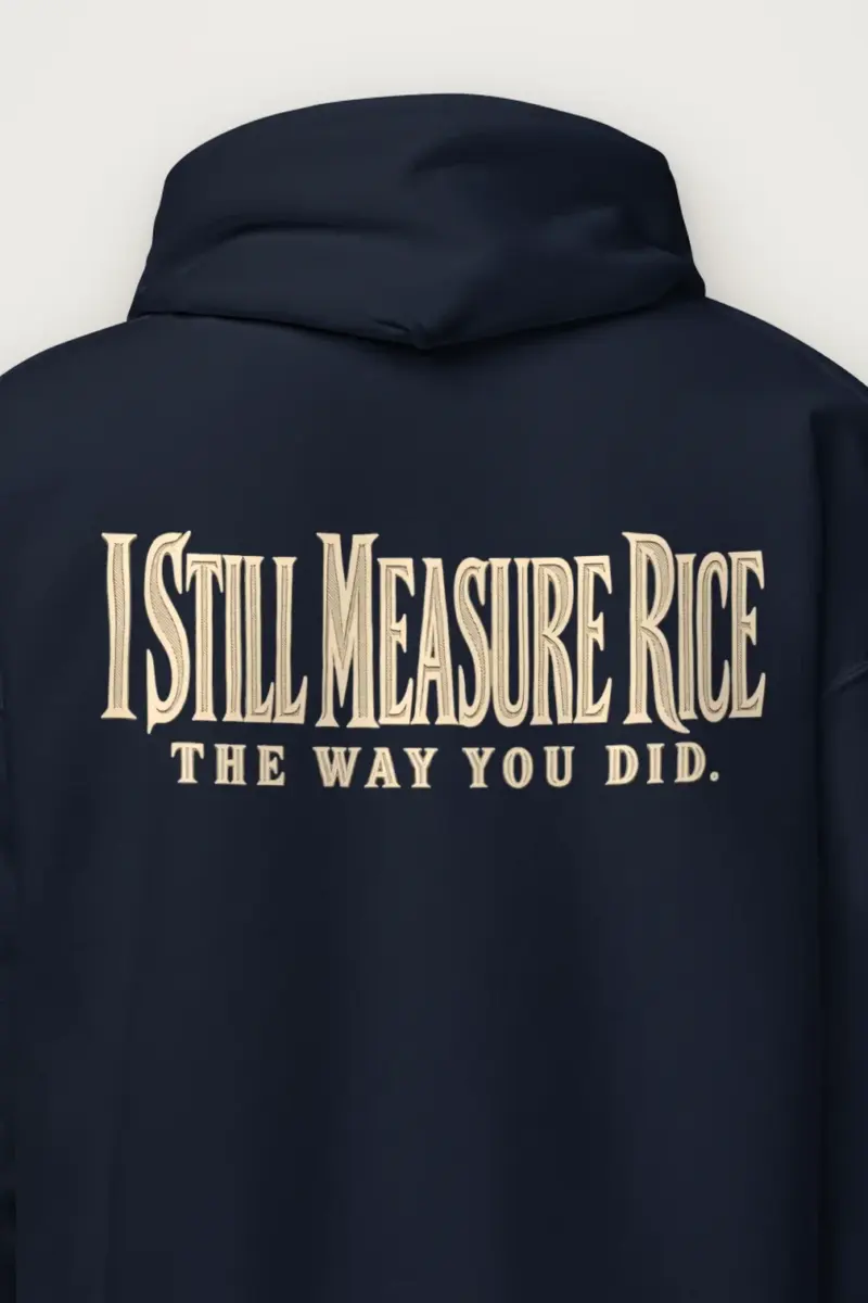 "I Still Measure Rice The Way You Did." Heavy Blend Unisex Pullover Hoodie - the graphic up close