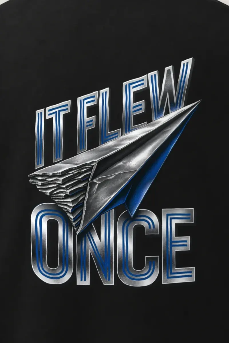 "It Flew Once" Men’s Oversized Heavyweight Crewneck T-Shirt - the graphic up close