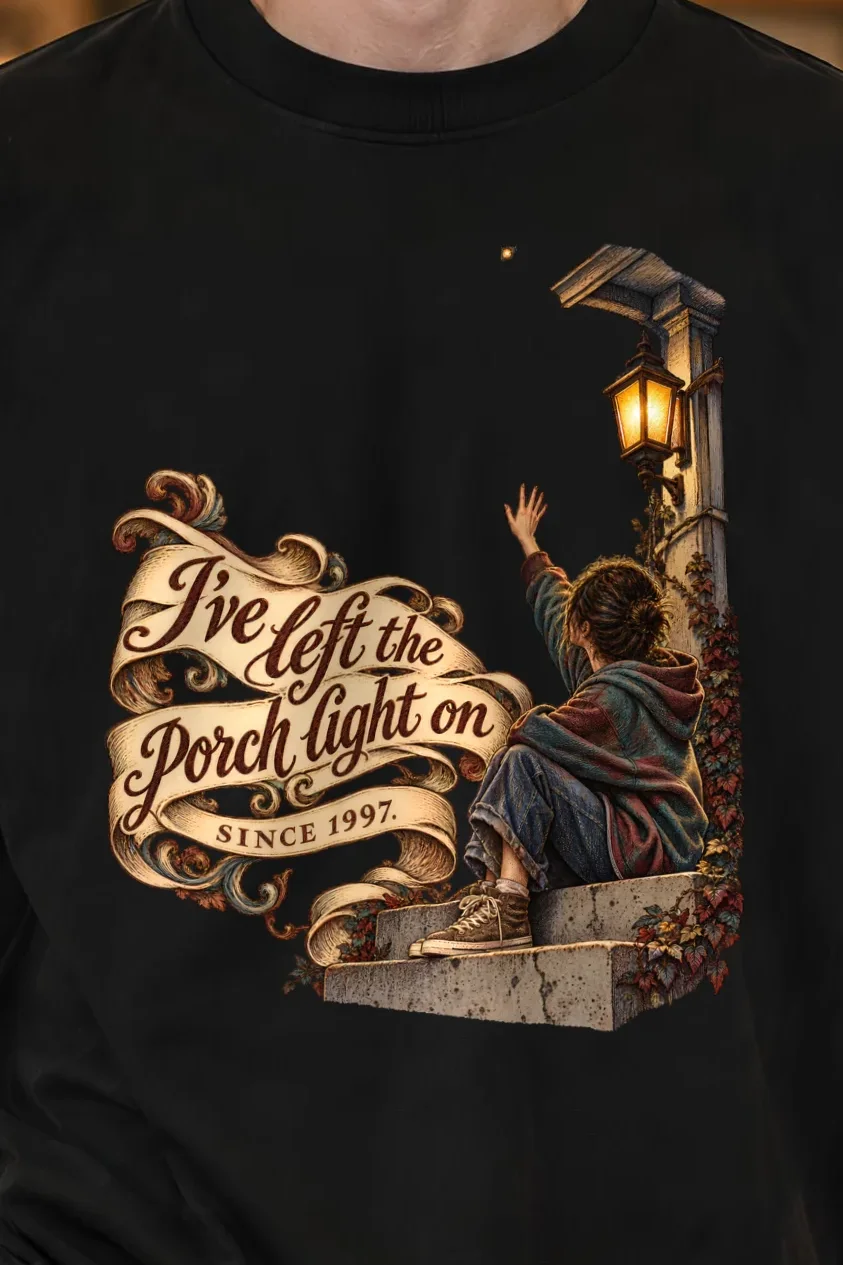 "I’ve Left the Porch Light On" Unisex Oversized Heavyweight Crewneck T-Shirt - the graphic up close