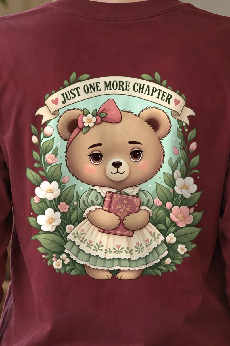 "Just One More Chapter" Unisex Longsleeve T-shirt - the graphic up close
