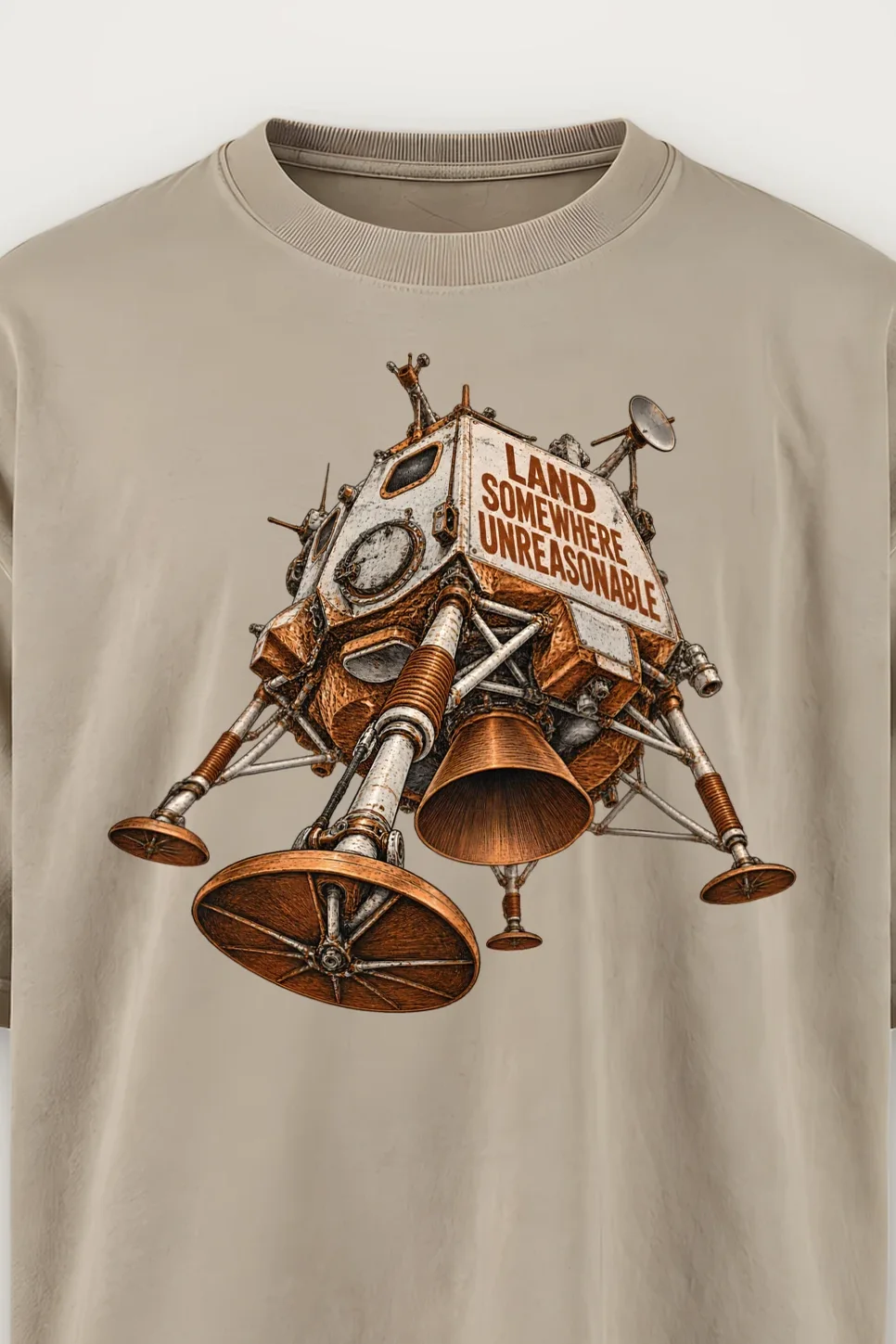 "Land Somewhere Unreasonable" Men’s Oversized Heavyweight Crewneck T-Shirt - the graphic up close