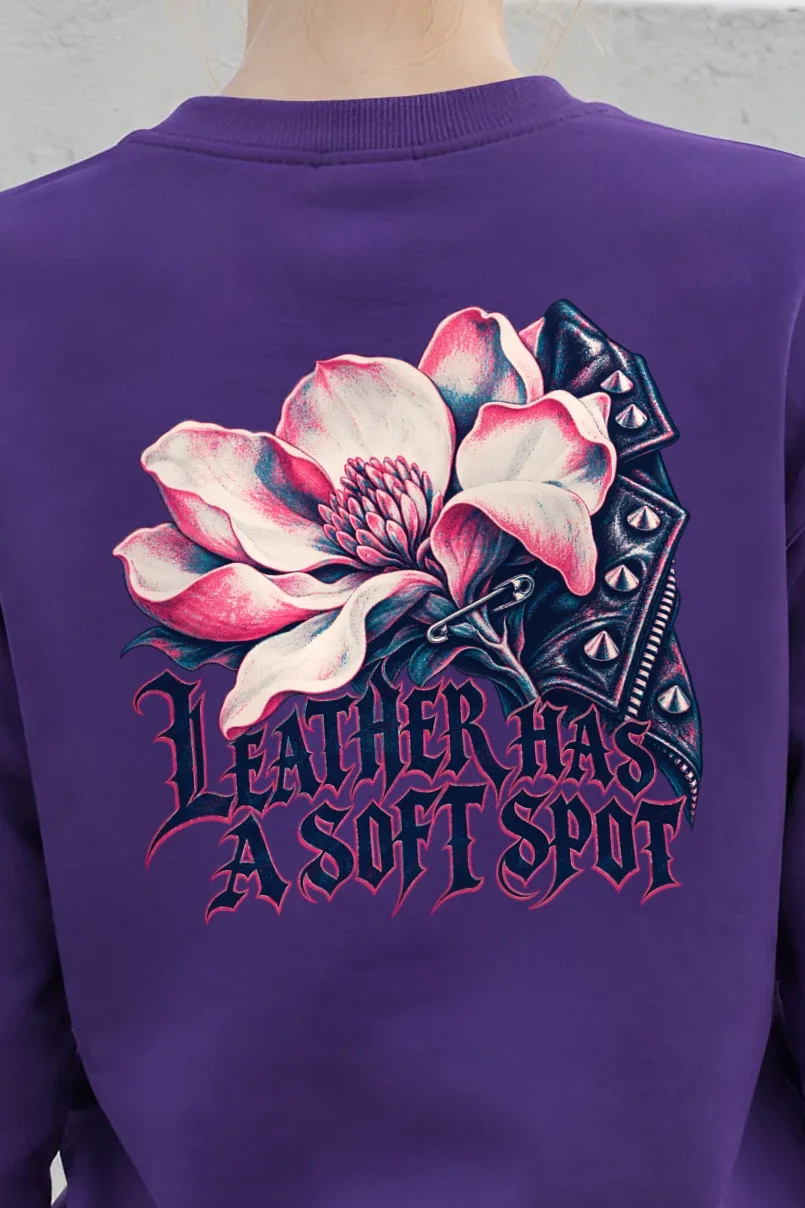 "Leather Has a Soft Spot" Heavy Blend Unisex Crewneck Sweatshirt - the graphic up close