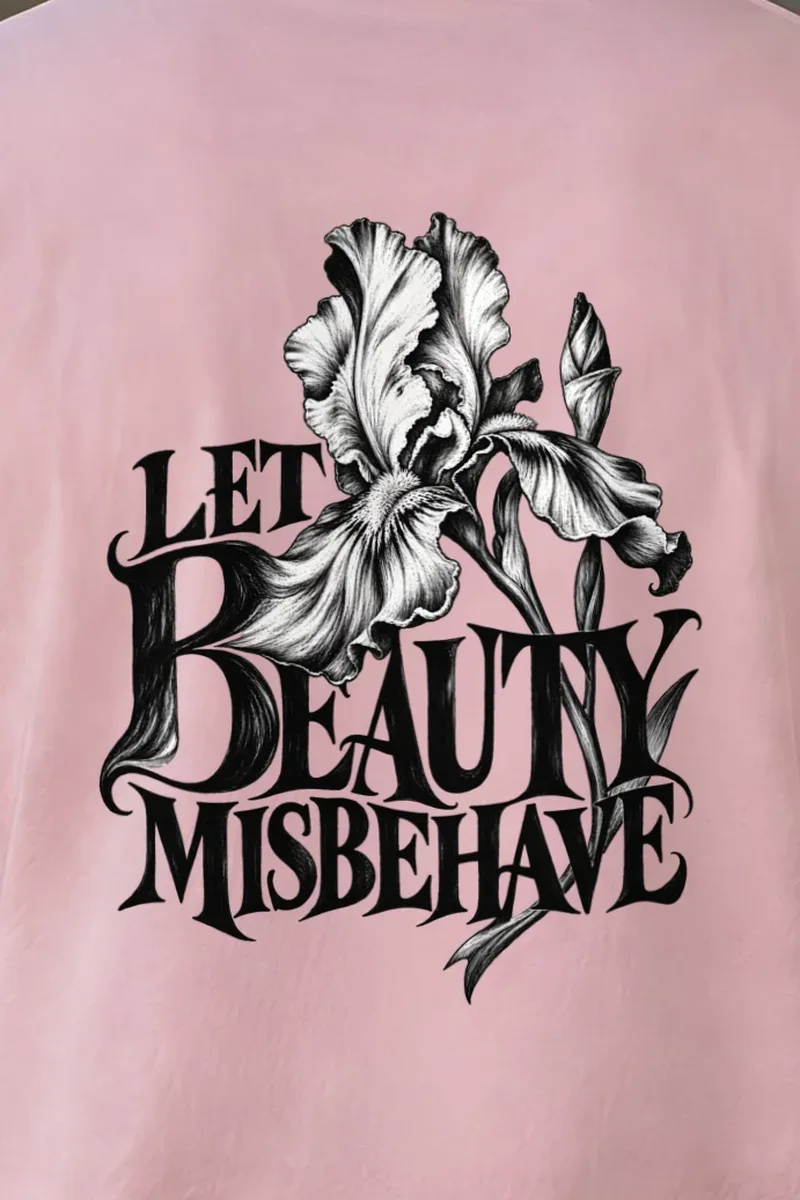 "Let Beauty Misbehave" Heavyweight Unisex Crewneck T-shirt - the graphic up close