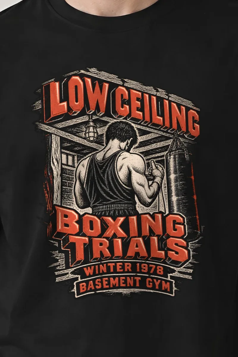 "Low Ceiling Boxing Trials" Heavyweight Unisex Crewneck T-shirt - the graphic up close