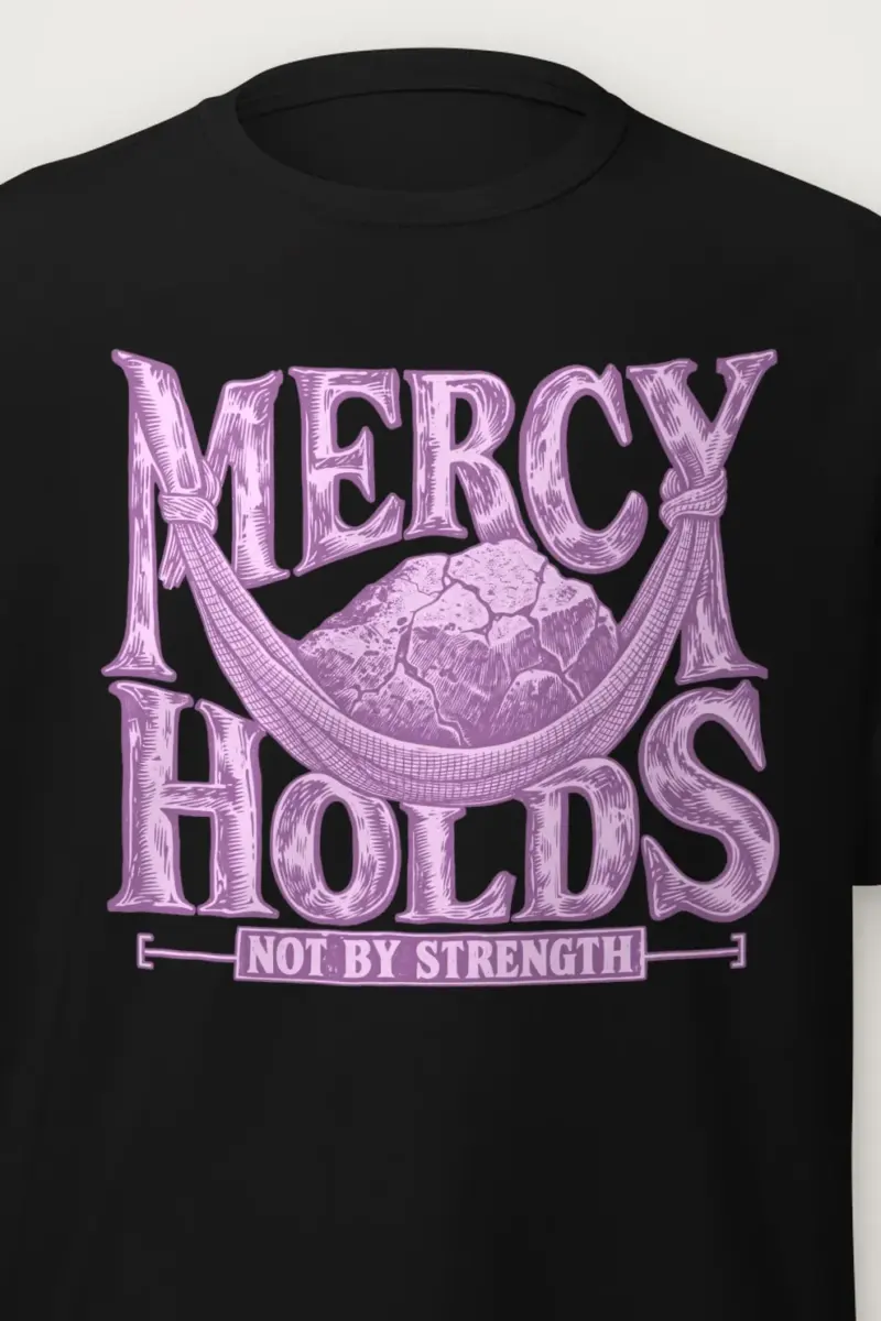 "Mercy Holds Not by Strength" Heavyweight Unisex Crewneck T-shirt - the graphic up close