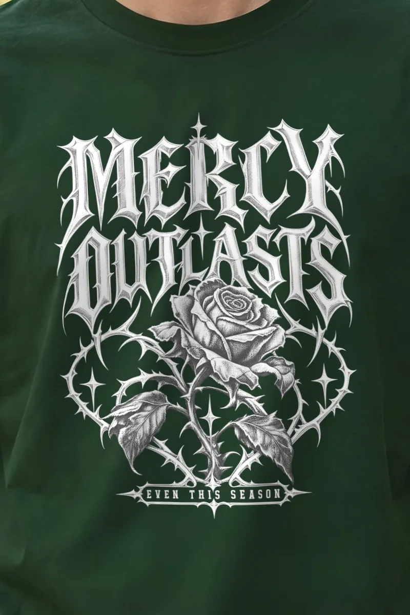 "Mercy Outlasts" Heavyweight Unisex Crewneck T-shirt - the graphic up close