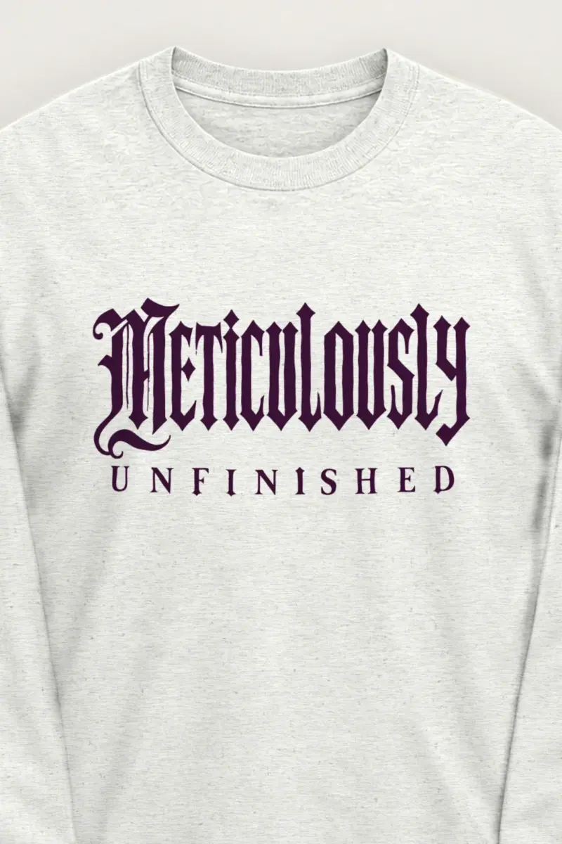 "Meticulously UNFINISHED" Unisex Longsleeve T-shirt - the graphic up close
