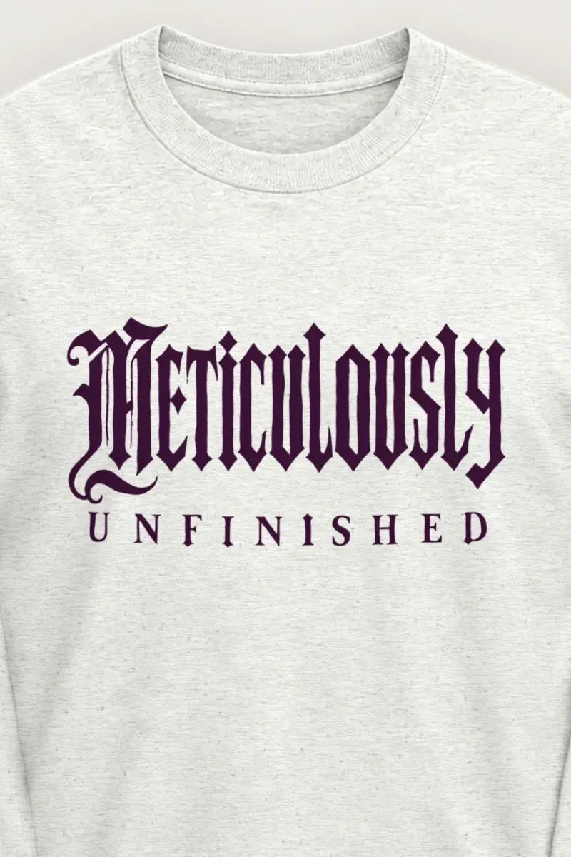"Meticulously UNFINISHED" Unisex Longsleeve T-shirt - the graphic up close