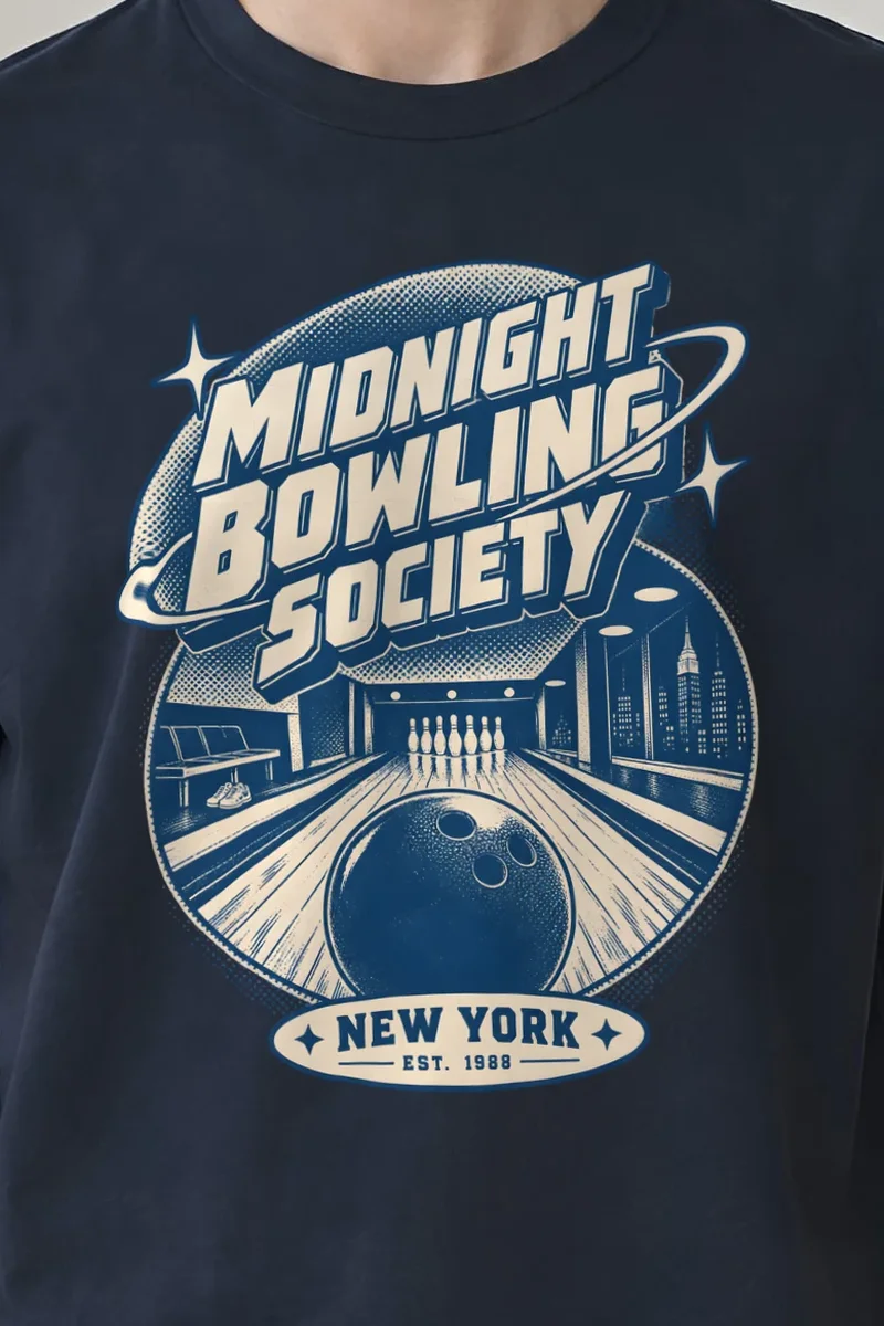 "Midnight Bowling Society" Heavyweight Unisex Crewneck T-shirt - the graphic up close