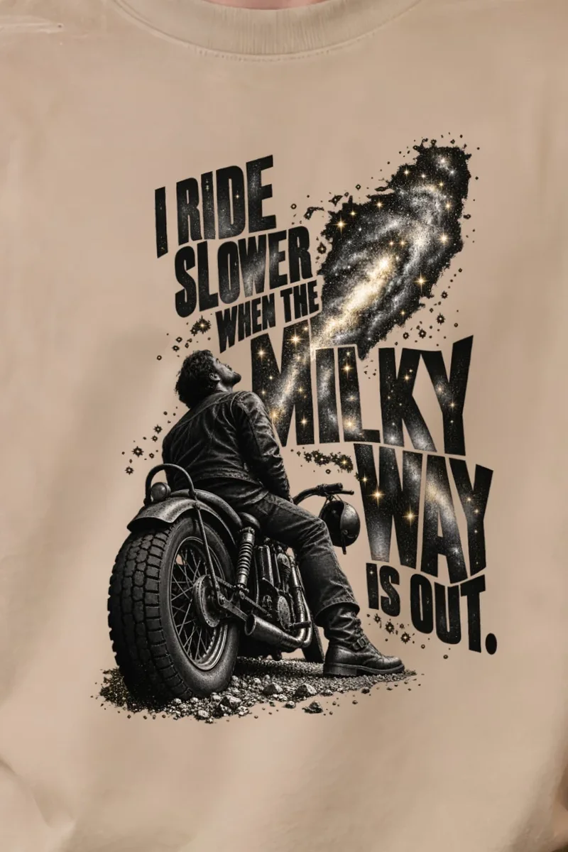 "Milky Way Motorcycle Rider" Unisex Oversized Heavyweight Crewneck T-Shirt - the graphic up close
