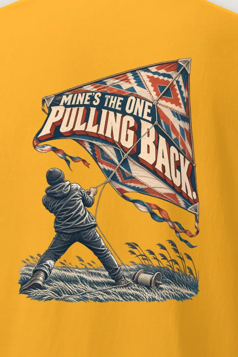 "Mine’s The One Pulling Back" Heavyweight Unisex Crewneck T-shirt - the graphic up close