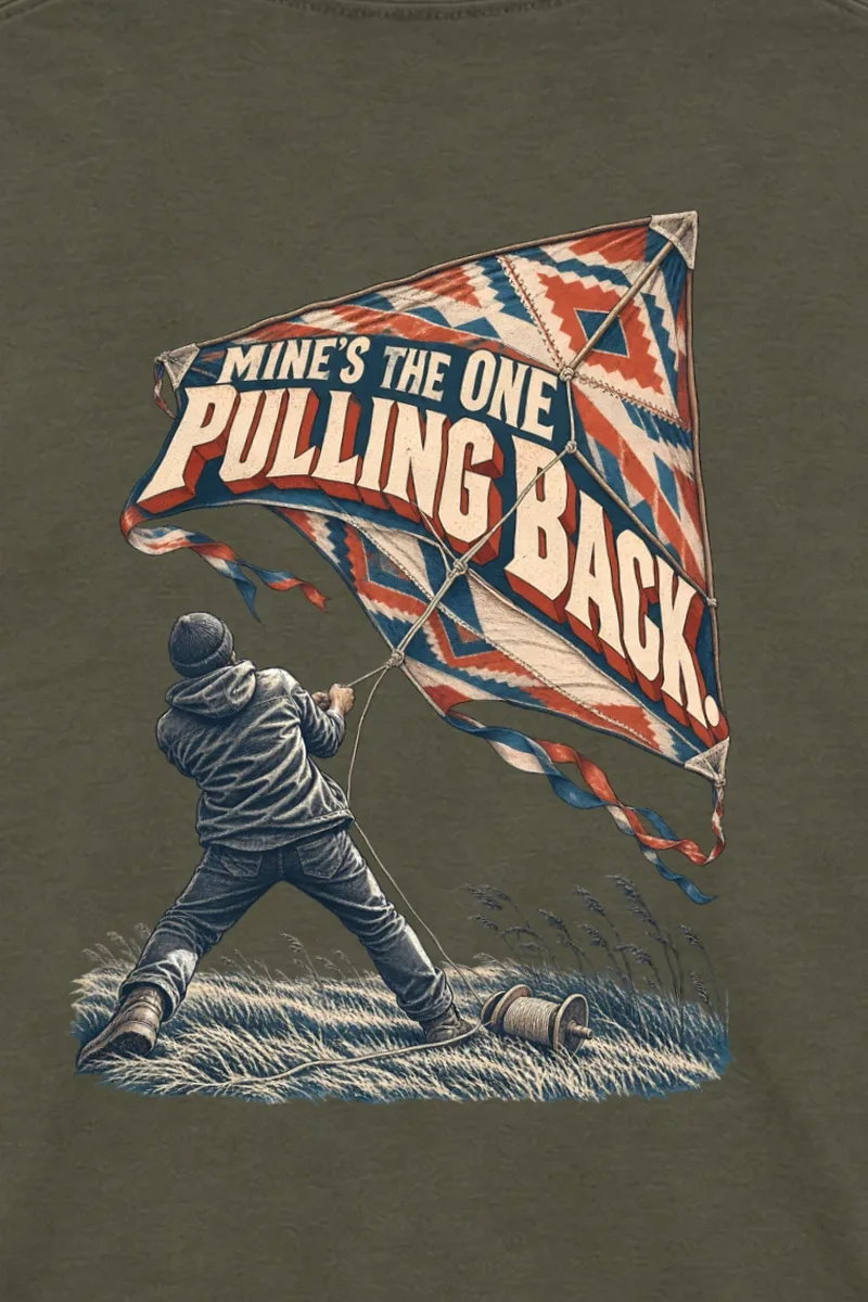 "Mine’s The One Pulling Back" Unisex Longsleeve T-shirt - the graphic up close