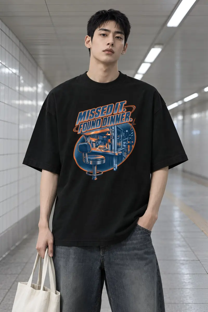 "Missed It. Found Dinner." Men's Oversized Heavyweight Crewneck T-Shirt