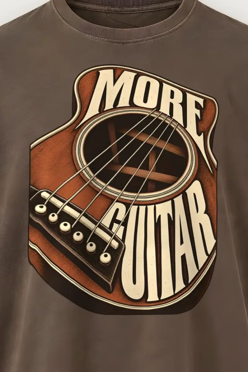 "More Guitar" Men’s Oversized Heavyweight Crewneck T-Shirt - the graphic up close