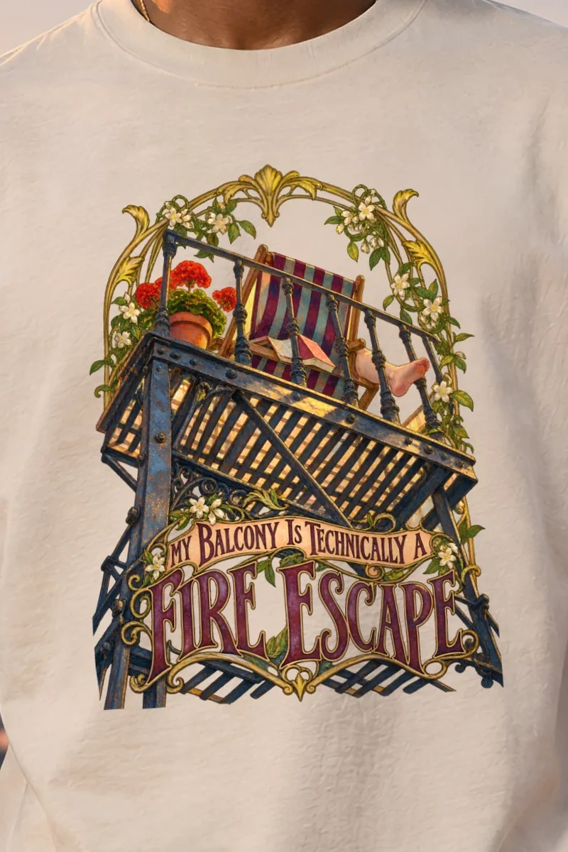 "My Balcony Is Technically a Fire Escape" Heavyweight Unisex Crewneck T-shirt - the graphic up close