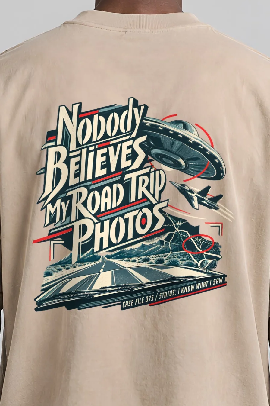 "Nobody Believes My Road Trip Photos" Men’s Oversized Heavyweight Crewneck T-Shirt - the graphic up close