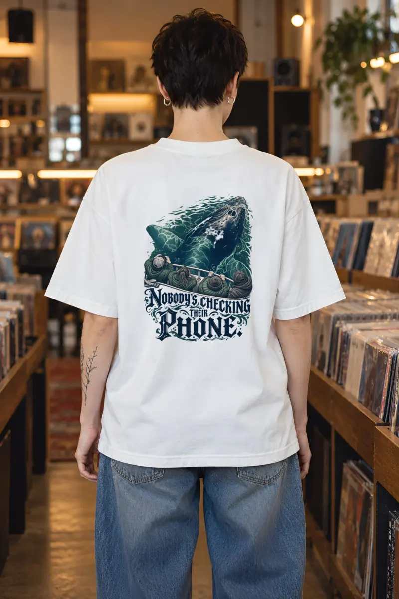 "Nobody's Checking Their Phone" Unisex Oversized Heavyweight Crewneck T-Shirt