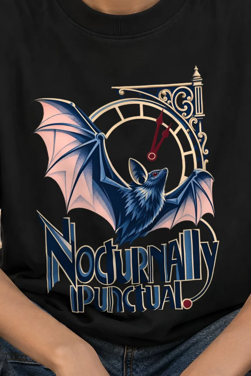"Nocturnally Punctual" Unisex Oversized Heavyweight Crewneck T-Shirt - the graphic up close