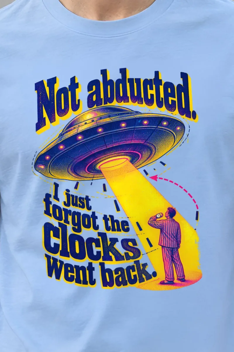 "Not Abducted, Forgot the Clocks" Heavyweight Unisex Crewneck T-shirt - the graphic up close