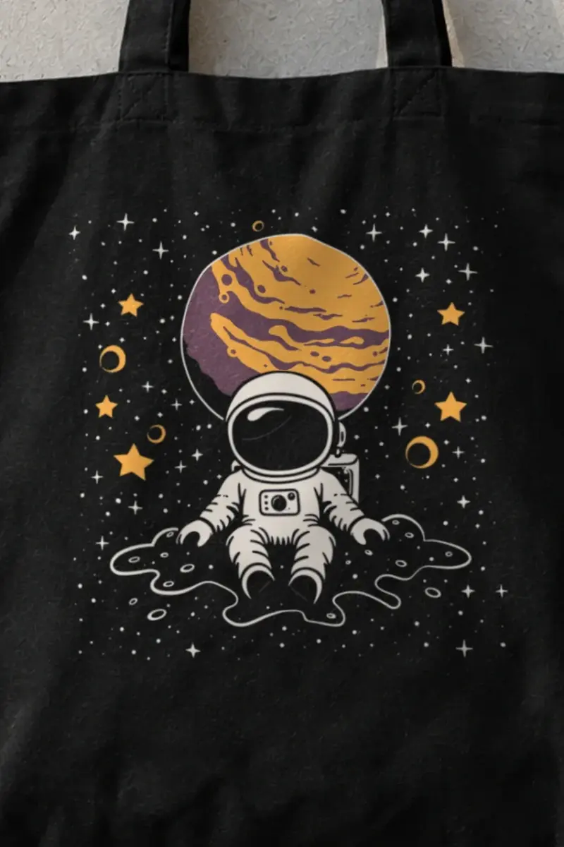 "Orbiting Astronaut" Classic Cotton Tote Bag - the graphic up close