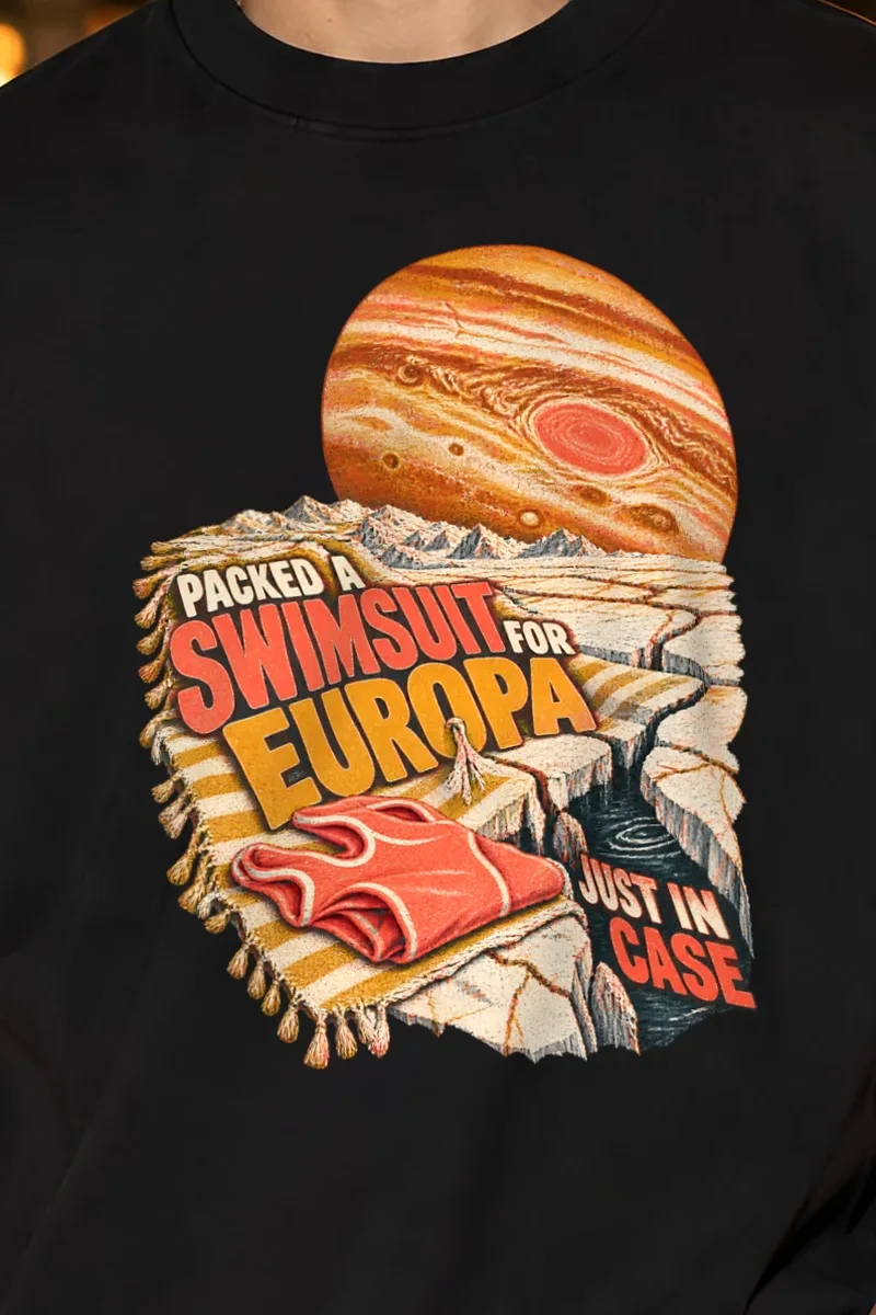 "Packed a Swimsuit for Europa" Unisex Oversized Heavyweight Crewneck T-Shirt - the graphic up close