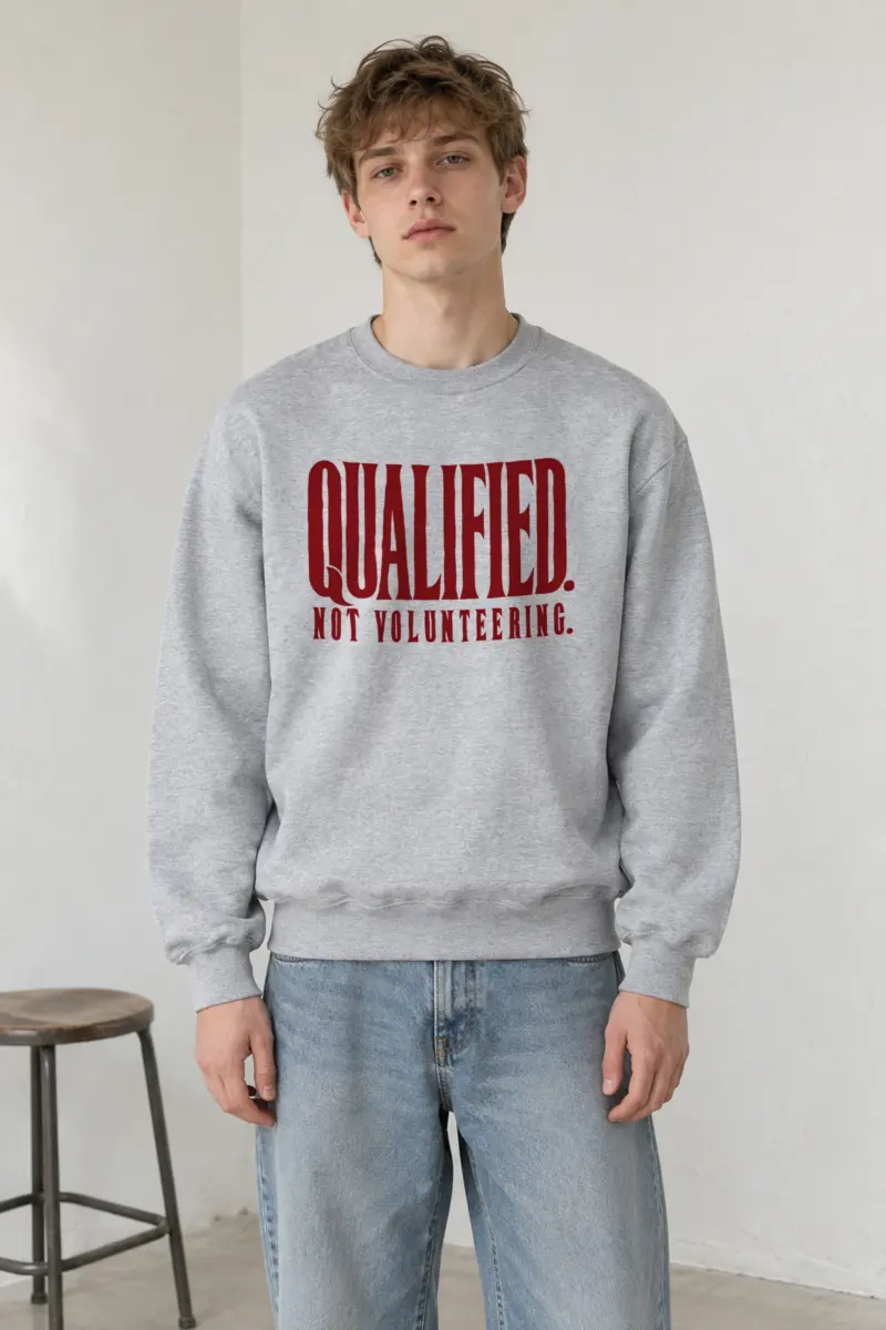 "Qualified. Not Volunteering." Heavy Blend Unisex Crewneck Sweatshirt