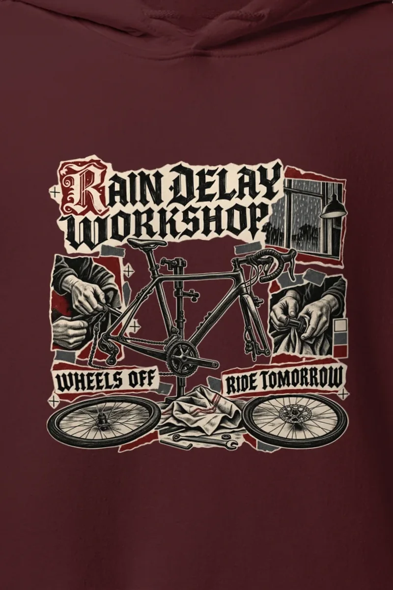 "RAIN DELAY WORKSHOP" Heavy Blend Unisex Pullover Hoodie - the graphic up close