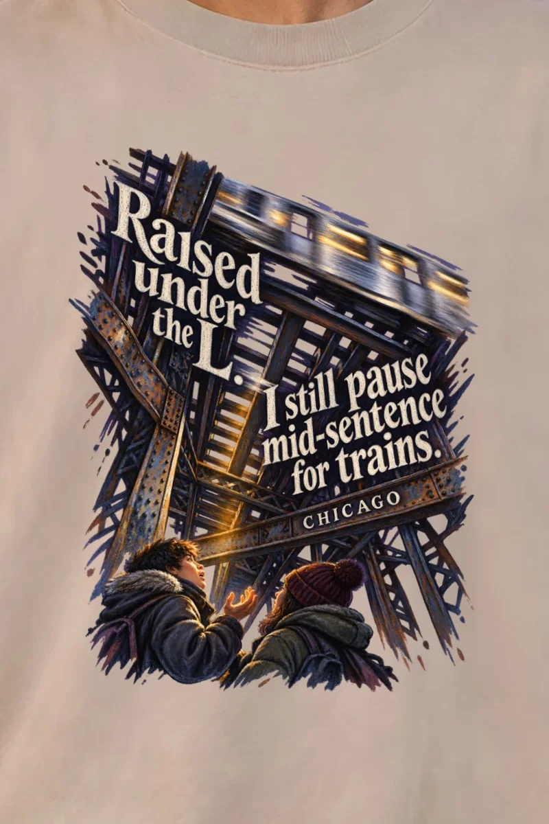 "Raised Under the L" Unisex Oversized Heavyweight Crewneck T-Shirt - the graphic up close