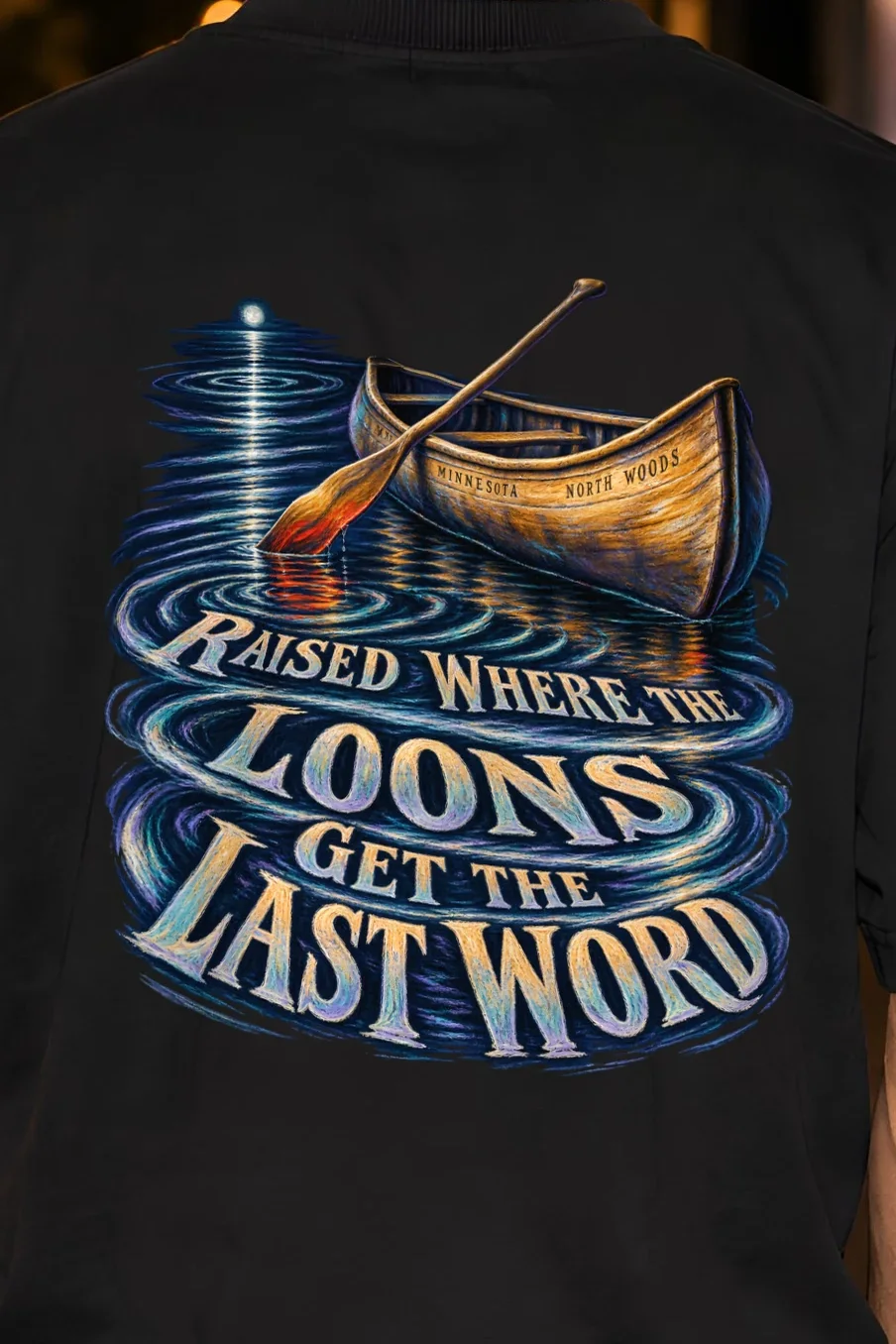 "Raised Where The Loons Get The Last Word" Unisex Oversized Heavyweight Crewneck T-Shirt - the graphic up close