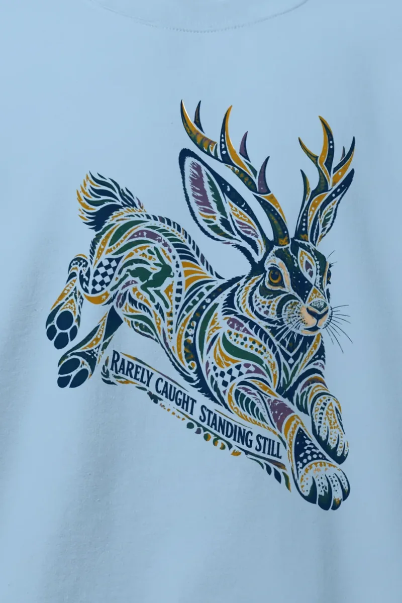 "Rarely Caught Standing Still" Heavy Blend Unisex Crewneck Sweatshirt - the graphic up close