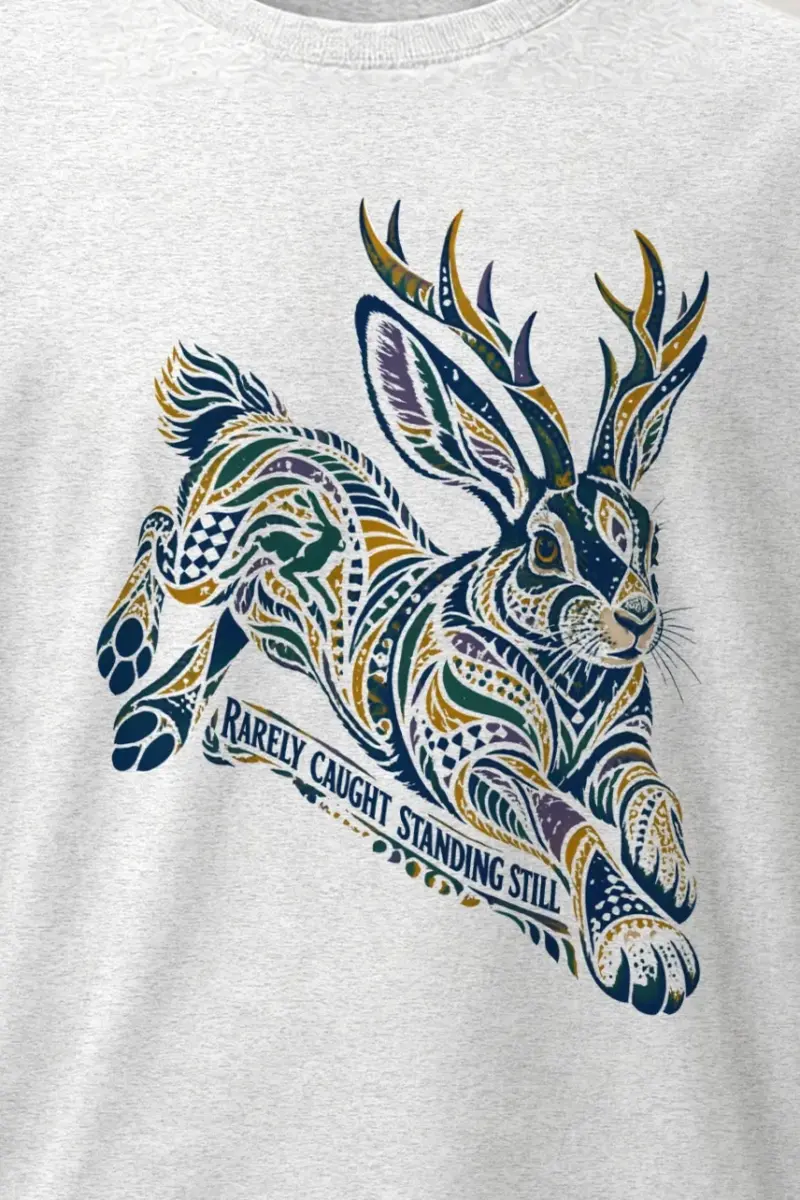 "Rarely Caught Standing Still" Heavyweight Unisex Crewneck T-shirt - the graphic up close