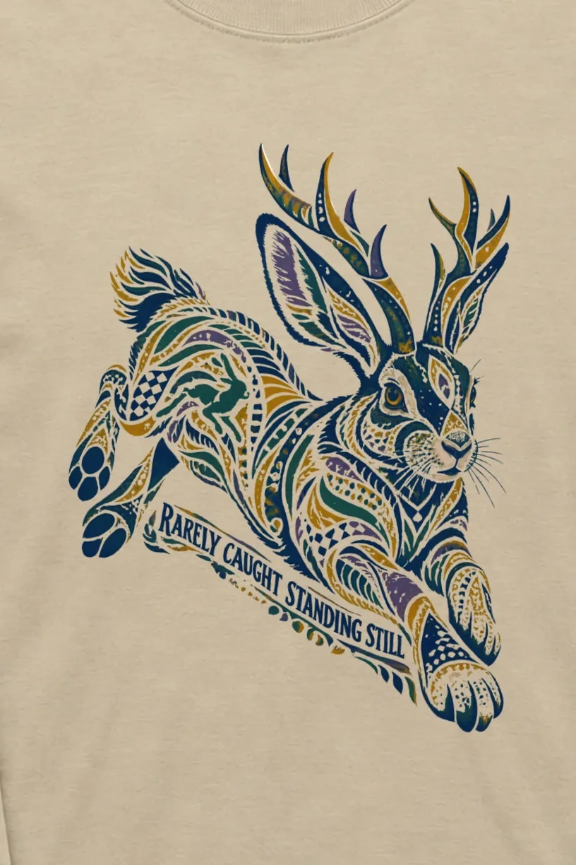 "Rarely Caught Standing Still" Unisex Longsleeve T-shirt - the graphic up close